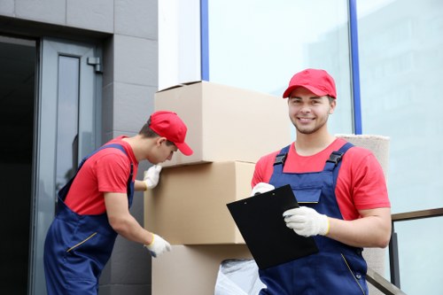 Removalists loading household furniture in Acton
