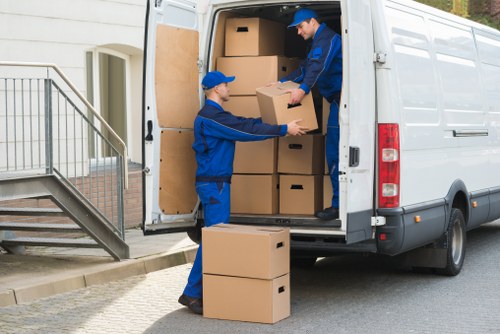 Packed boxes and furniture prepared for removals van transport