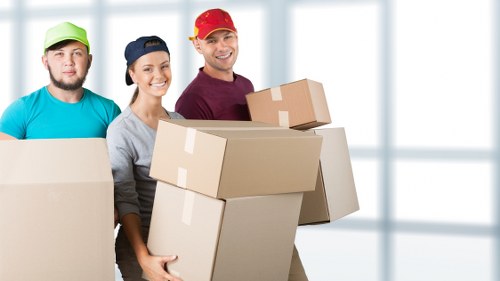 Office relocation service in Acton with moving equipment