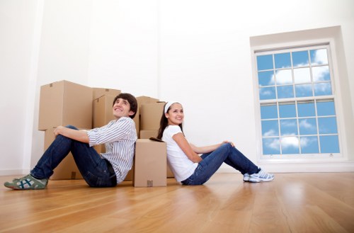 Removal van and packing boxes for a house move in Acton
