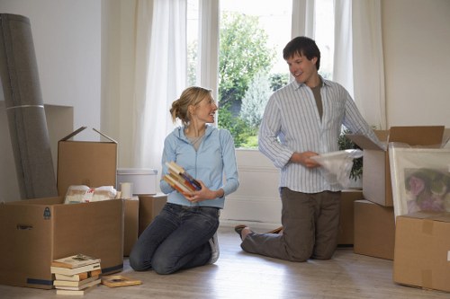 Packed boxes and furniture prepared for removals in Acton